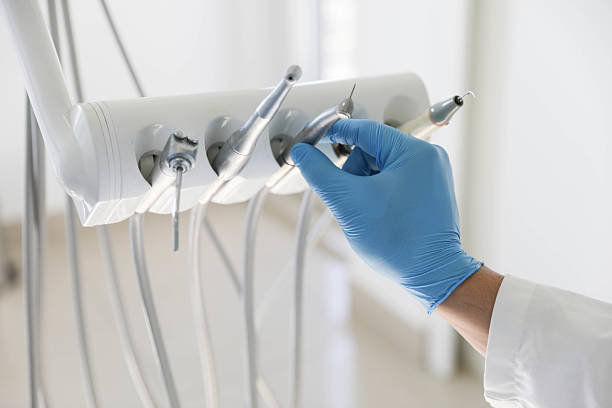 Professional Tooth Extraction technician working in Orion, IL